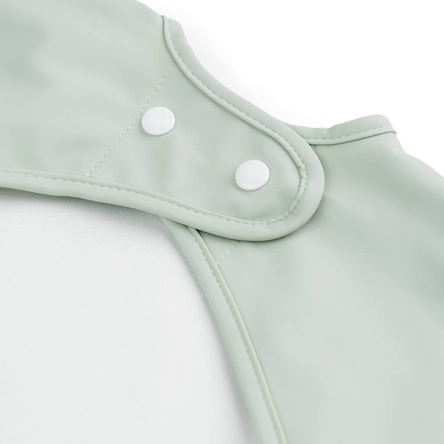 Done by Deer Slabbetje Met Mouwen Croco Green koop je bij Babywinkel
