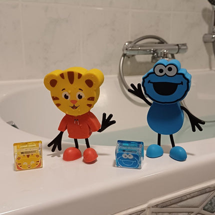 Glopals Badspeelgoed Sensorisch Light - Up Poppetje en Cubes Cookie koop je bij Babywinkel