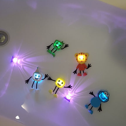 Glopals Badspeelgoed Sensorisch Light - Up Poppetje en Cubes Cookie koop je bij Babywinkel