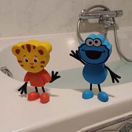 Glopals Badspeelgoed Sensorisch Light - Up Poppetje en Cubes Cookie koop je bij Babywinkel