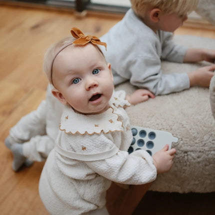 Mushie Educatief Speelgoed Druk Telefoon Tradewinds koop je bij Babywinkel