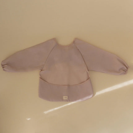 Mushie Slabbetje Lange Mouwen Blush koop je bij Babywinkel