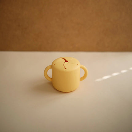 Mushie Snackbakje Pale Daffodil koop je bij Babywinkel